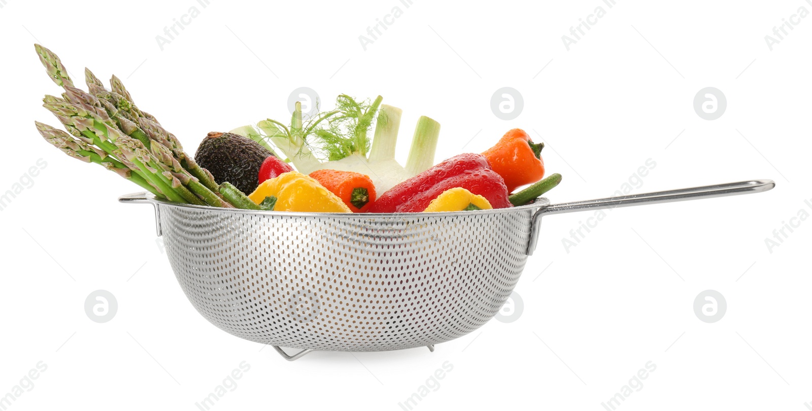 Photo of Metal colander with different vegetables and avocado isolated on white