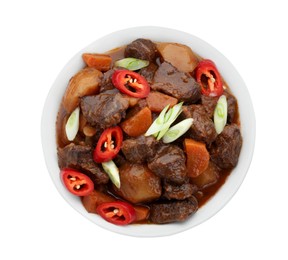 Photo of Delicious beef stew with carrots, chili peppers, green onions and potatoes on white background, top view