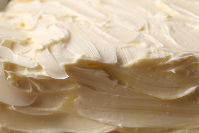 Tasty homemade butter as background, closeup view