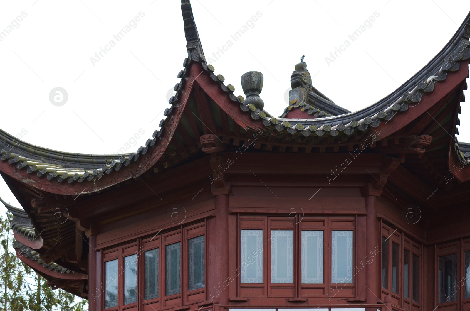 Photo of HAREN, NETHERLANDS - MAY 23, 2022: Beautiful view of oriental building in Chinese garden