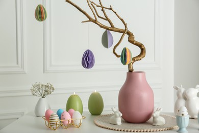 Beautiful festive composition with Easter decor on white table indoors