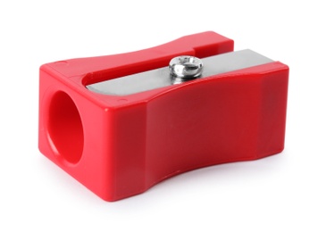 Image of Bright red pencil sharpener isolated on white. School stationery