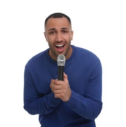 Photo of Handsome man with microphone singing on white background