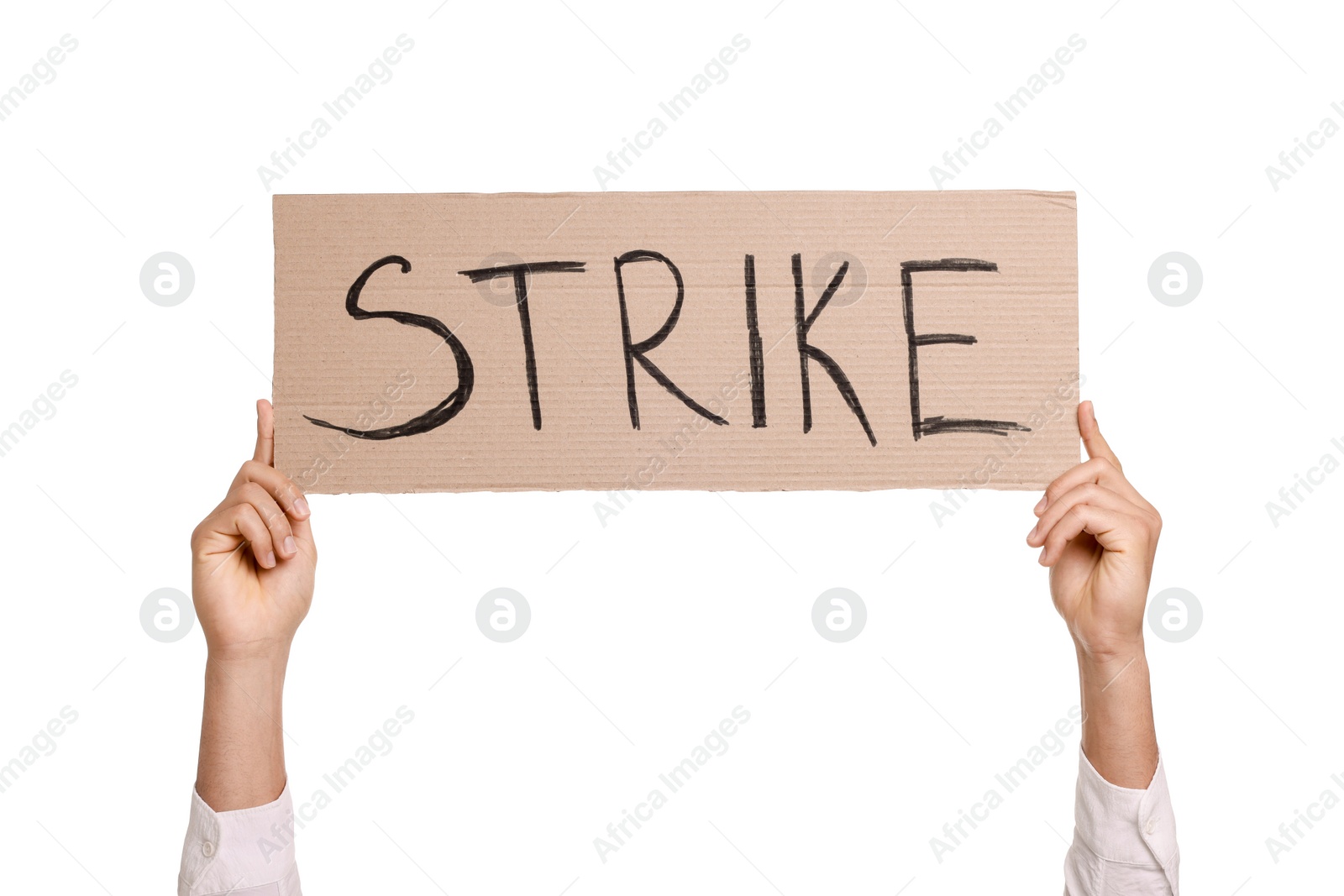 Photo of Man holding cardboard banner with word Strike on white background, closeup