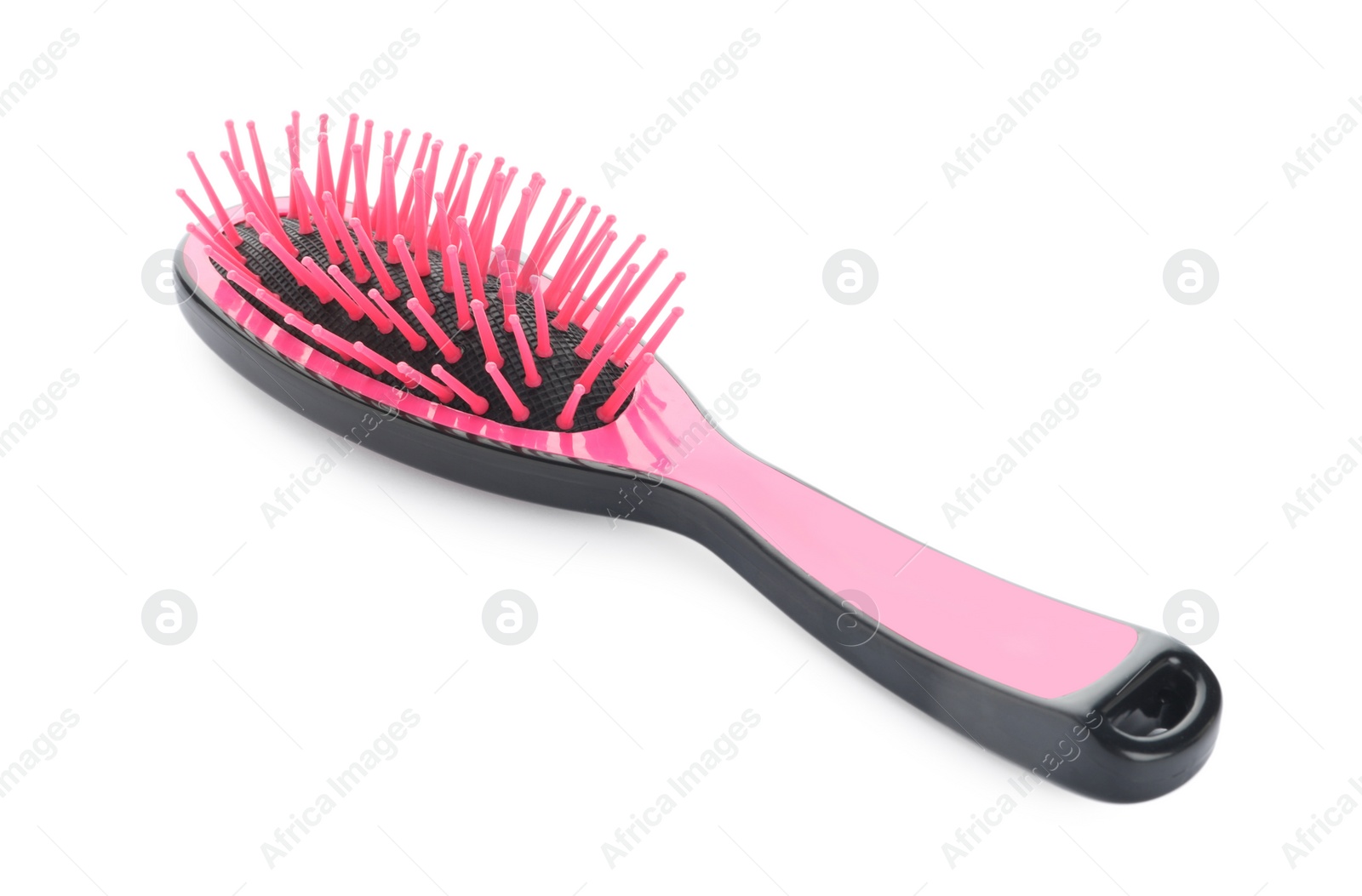 Photo of New modern hair brush isolated on white