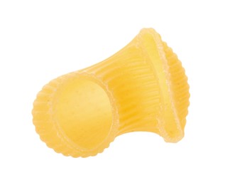 Photo of One piece of raw horns pasta isolated on white