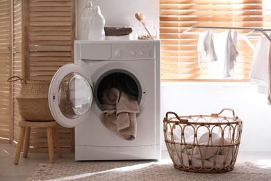 Stylish room interior with washing machine. Design idea