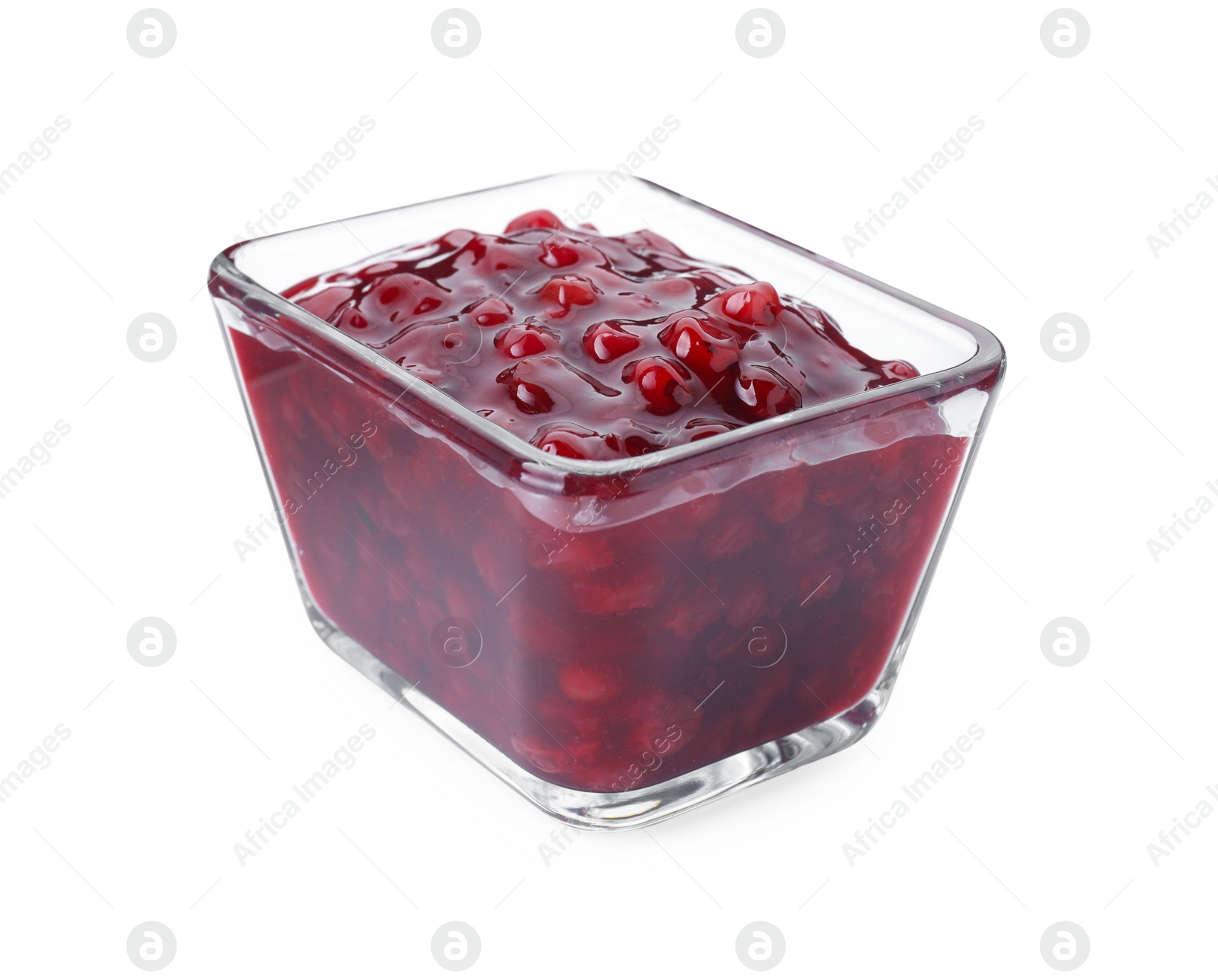 Photo of Fresh cranberry sauce in glass bowl isolated on white