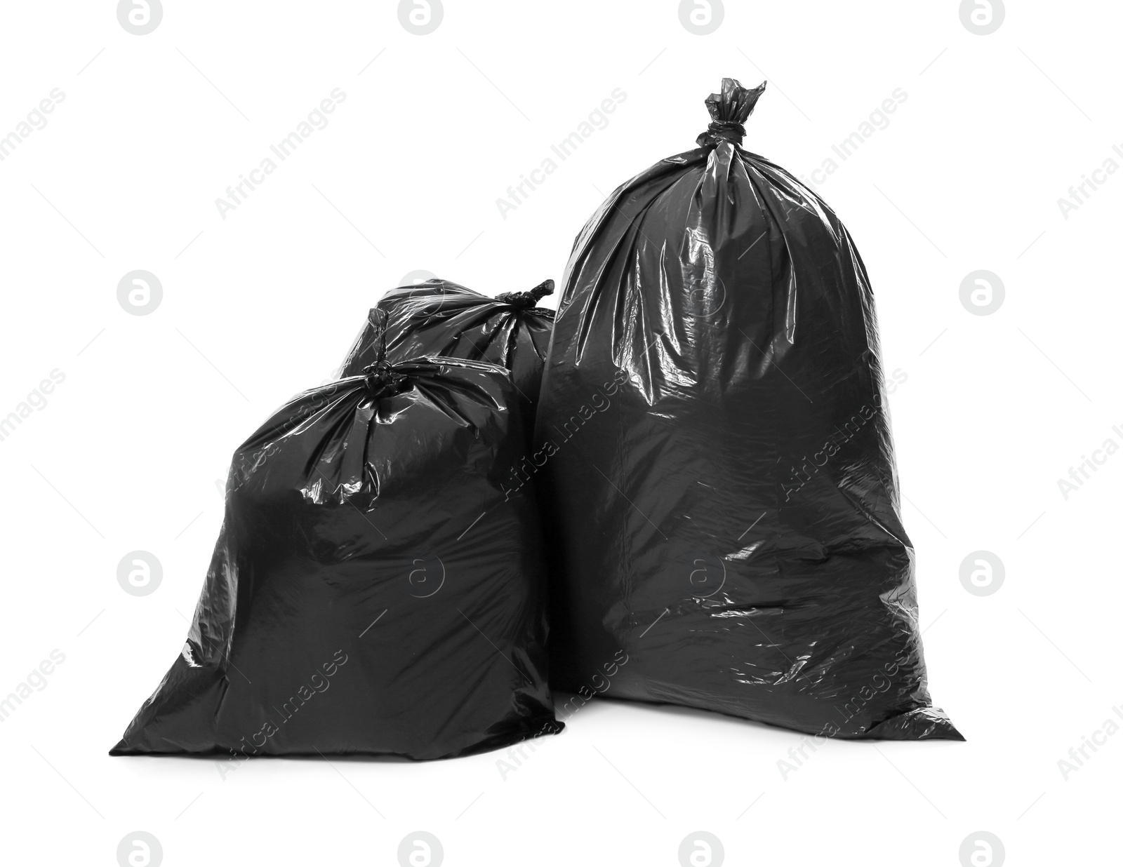 Photo of Trash bags full of garbage isolated on white