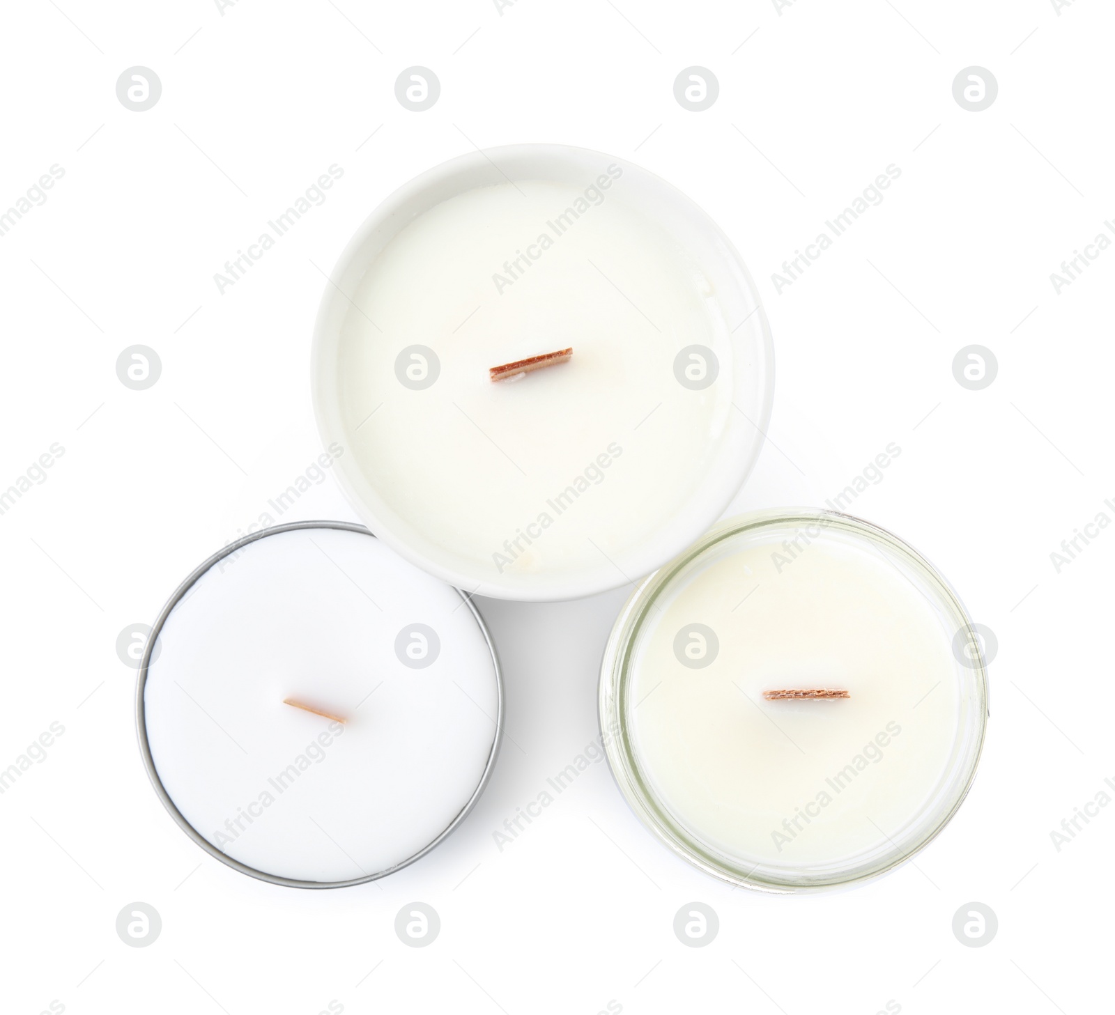 Photo of Beautiful candles with wooden wicks on white background, top view