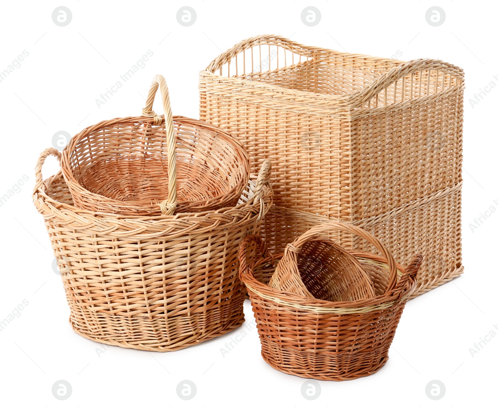 Photo of Many different wicker baskets on white background