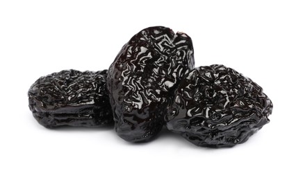 Photo of Sweet dried prunes on white background. Healthy snack