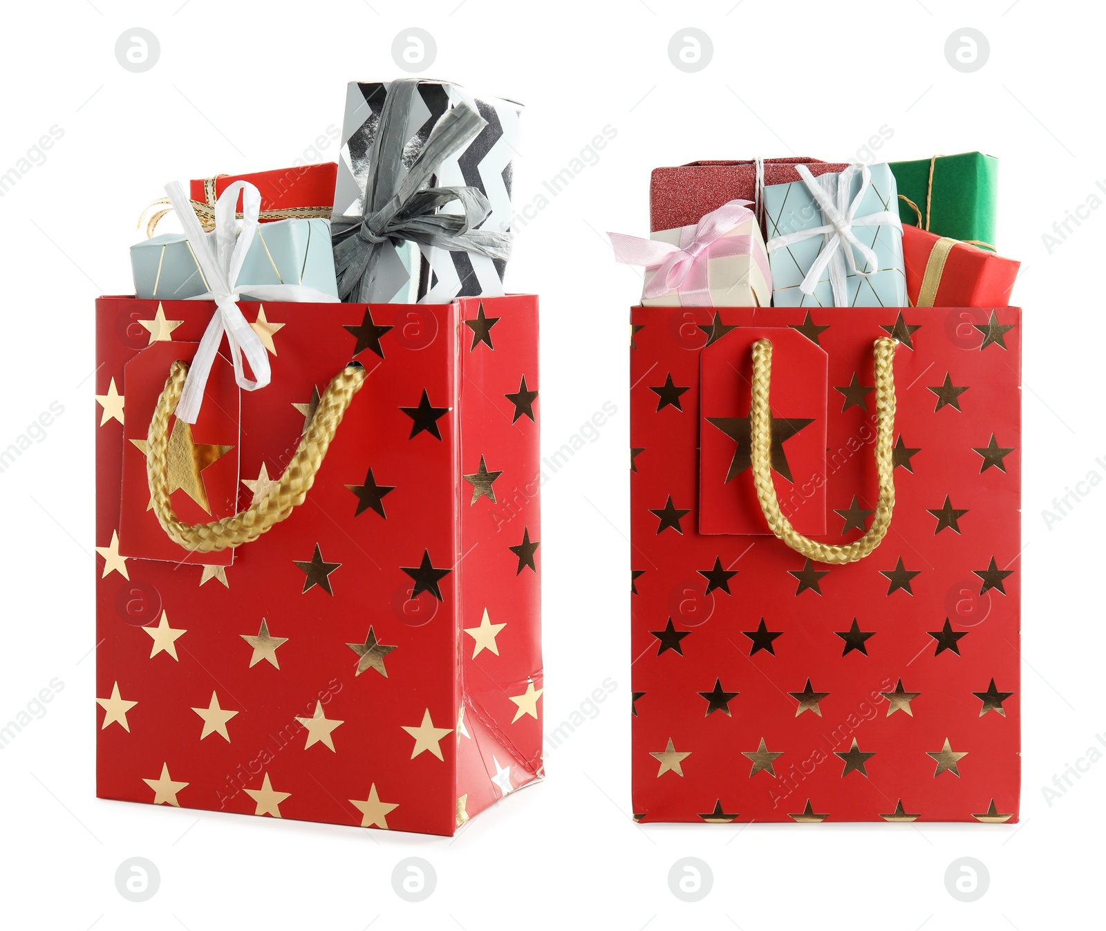 Image of Bright paper shopping bags with gifts on white background