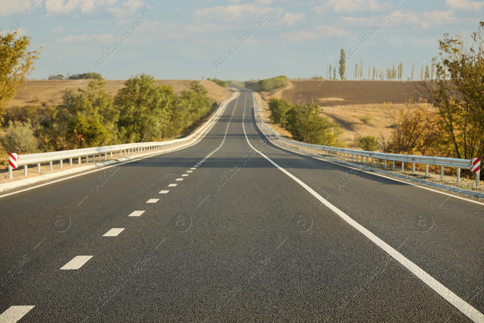 Photo of Beautiful view of empty asphalt highway. Road trip