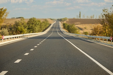 Photo of Beautiful view of empty asphalt highway. Road trip