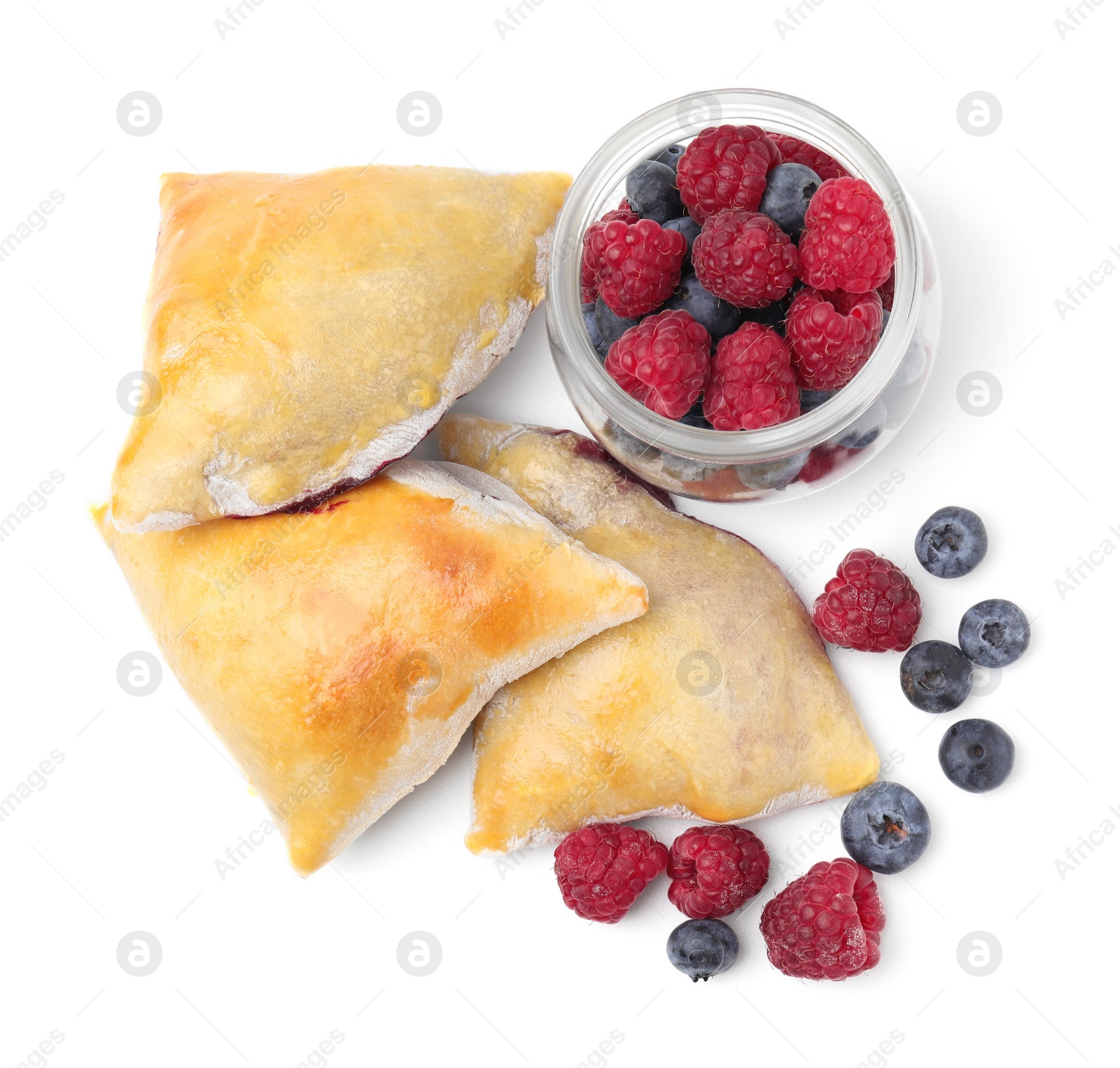 Photo of Delicious samosas with berries isolated on white, top view