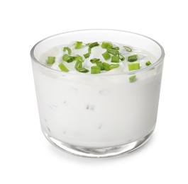 Photo of Bowl with sour cream and herbs on white background