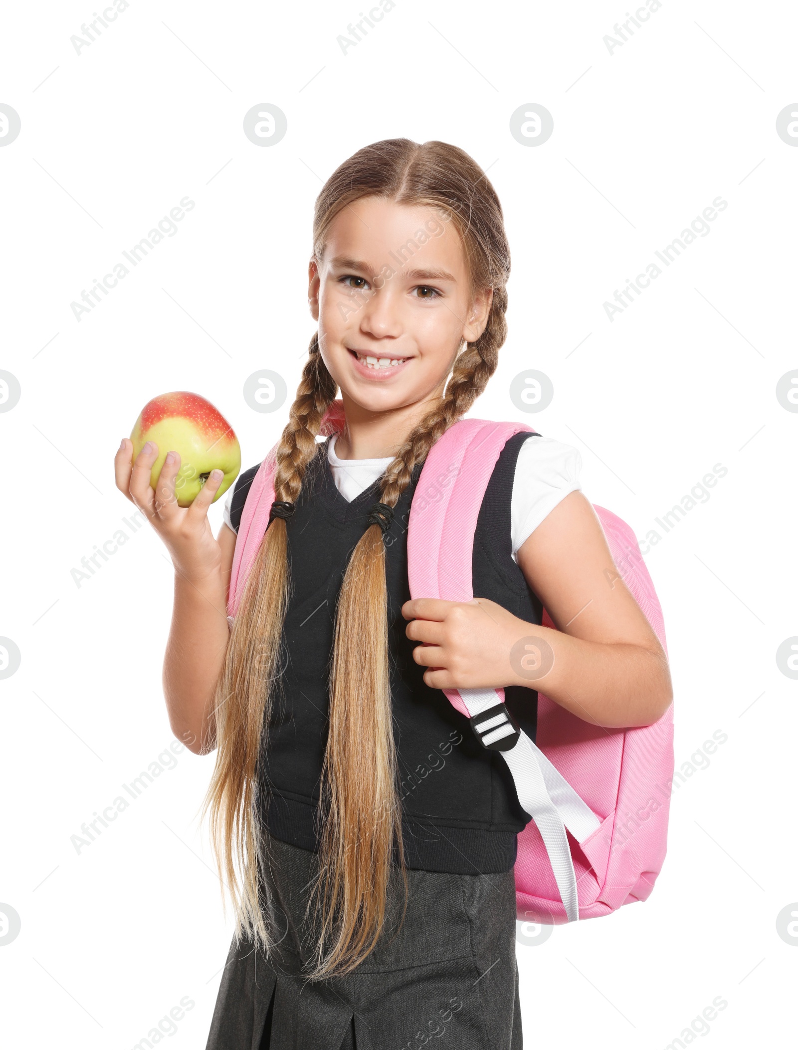 Photo of Schoolgirl with healthy food and backpack on white background