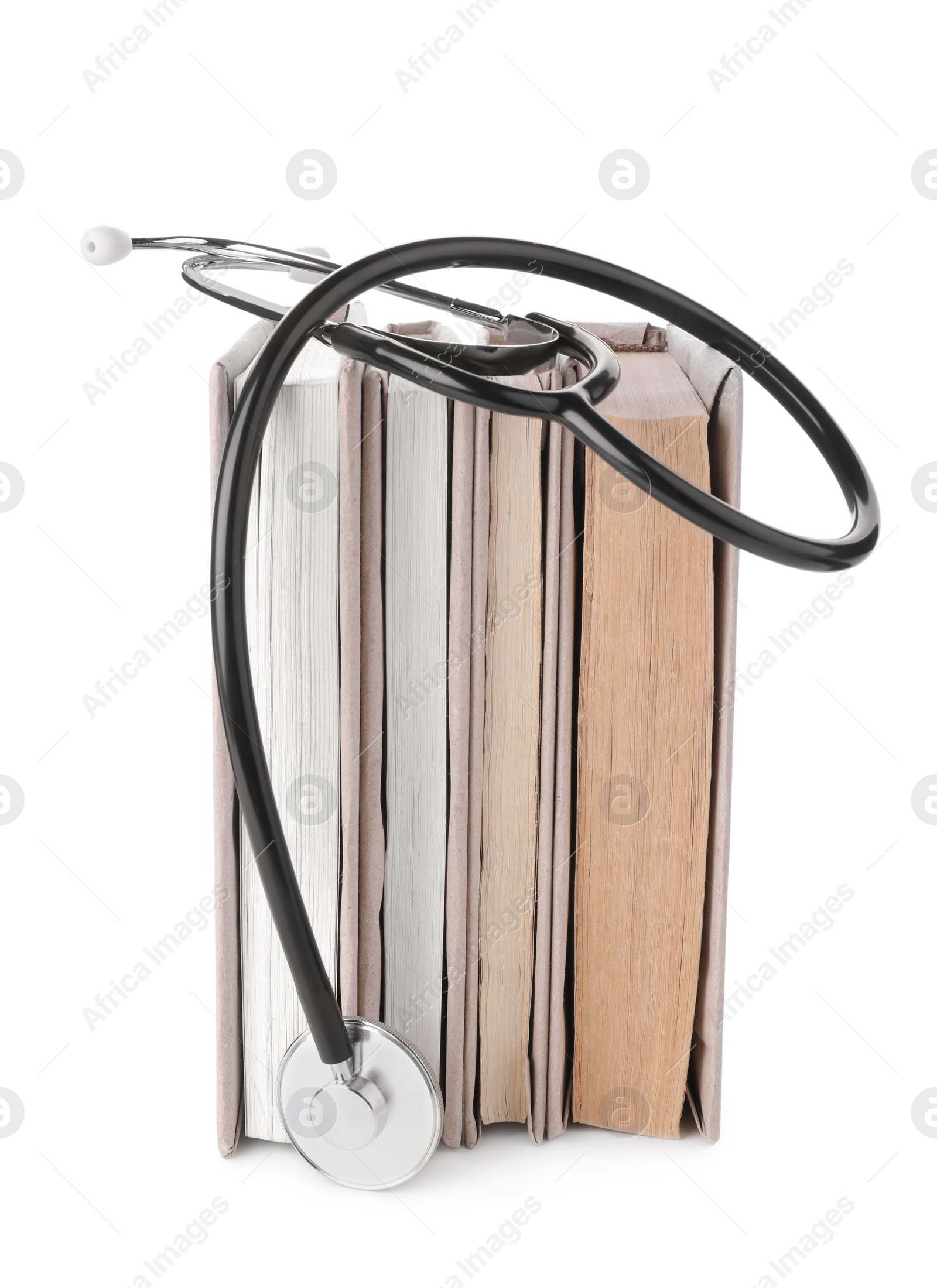 Photo of Student textbooks and stethoscope on white background. Medical education