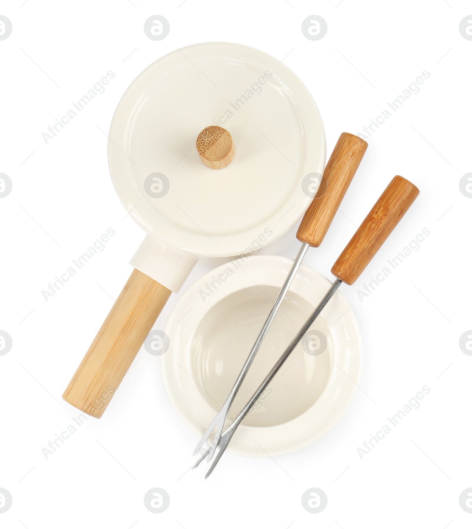 Photo of Fondue set isolated on white, top view. Kitchen equipment