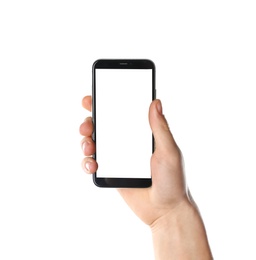 Man holding smartphone with blank screen on white background, closeup of hand. Space for text