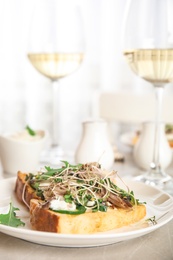 Photo of Delicious bruschettas with fish on marble table