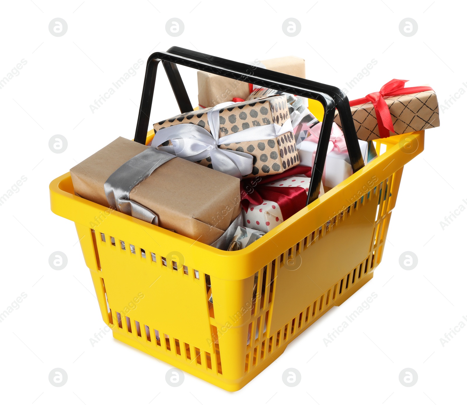 Photo of Shopping basket full of gift boxes on white background