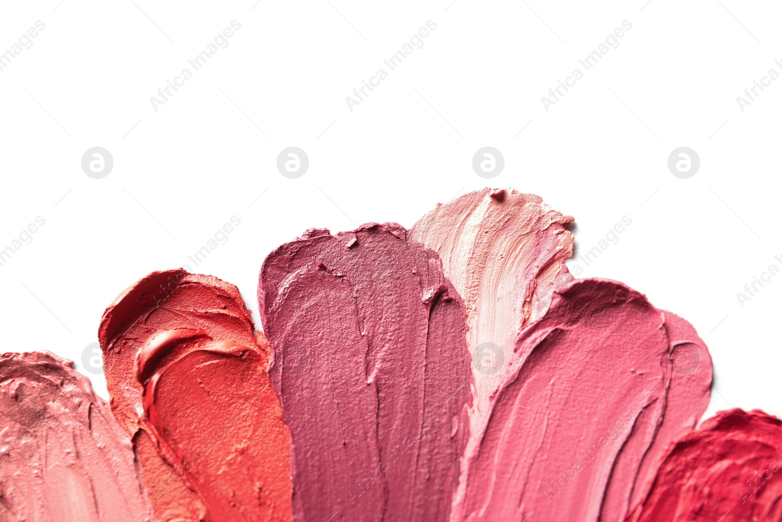 Photo of Lipstick smears isolated on white, top view. Space for text