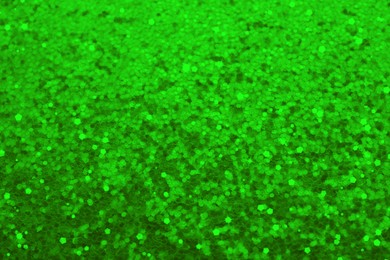 Image of St. Patrick day. Green glitter as background