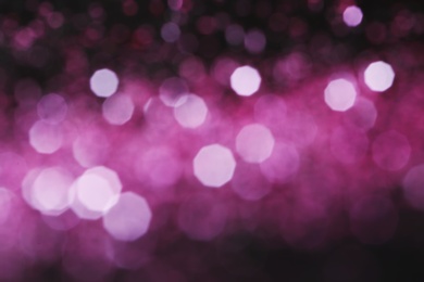 Magic pink bokeh effect on dark background