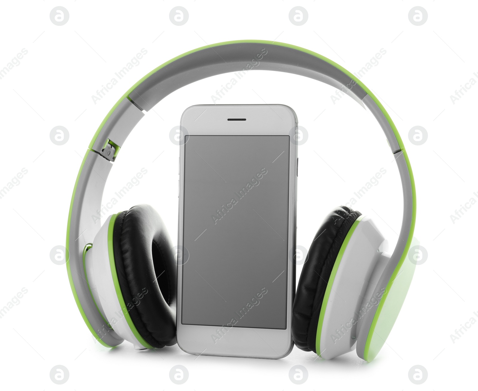 Photo of Smartphone with blank screen and headphones on white background