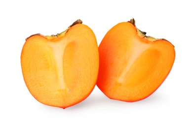 Photo of Halves of delicious ripe juicy persimmons on white background