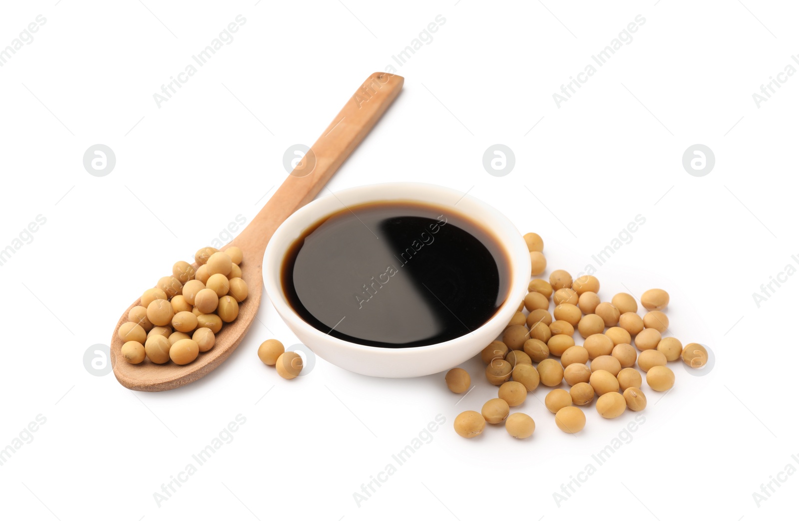 Photo of Bowl of soy sauce and soybeans isolated on white