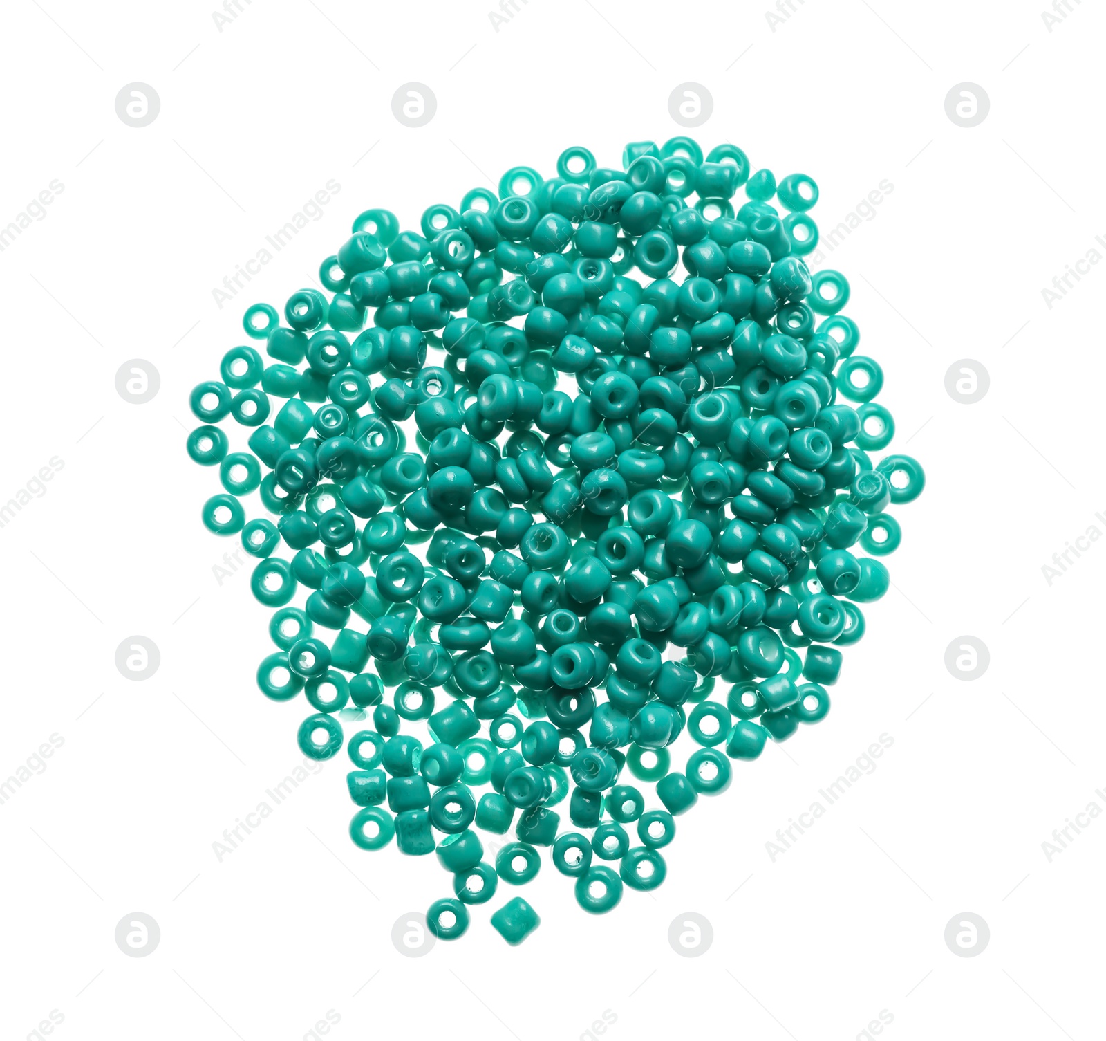 Photo of Pile of turquoise beads on white background, top view