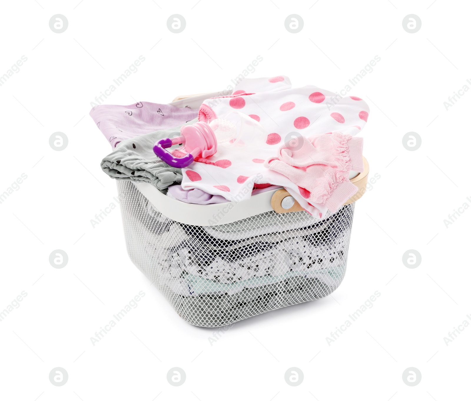 Photo of Laundry basket with baby clothes isolated on white