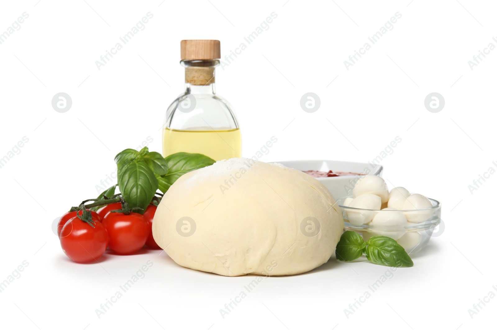 Photo of Composition with dough and fresh ingredients for pizza isolated on white