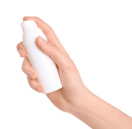 Photo of Young woman holding bottle with hand cream on white background