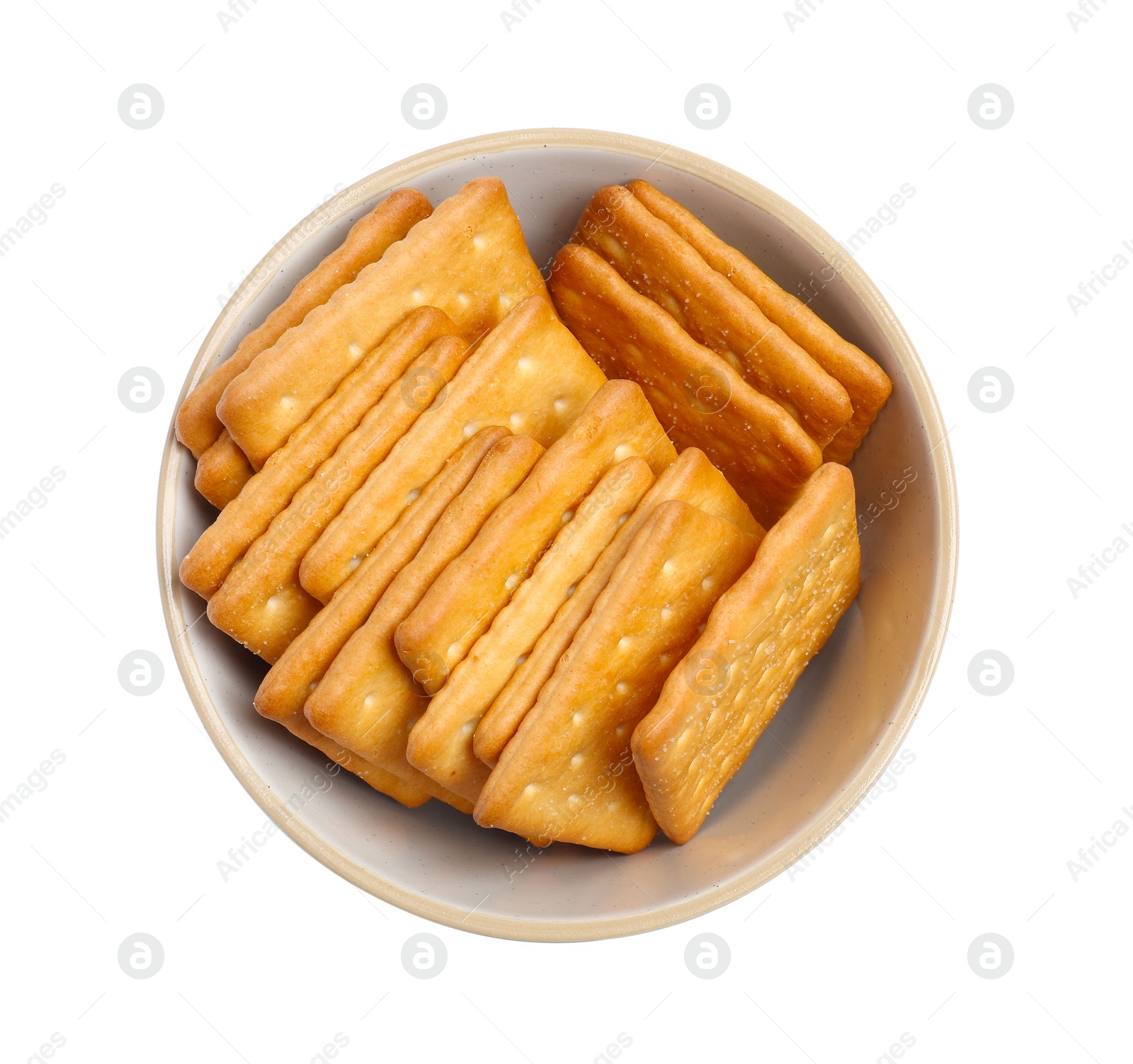 Photo of Tasty crackers in bowl isolated on white, top view