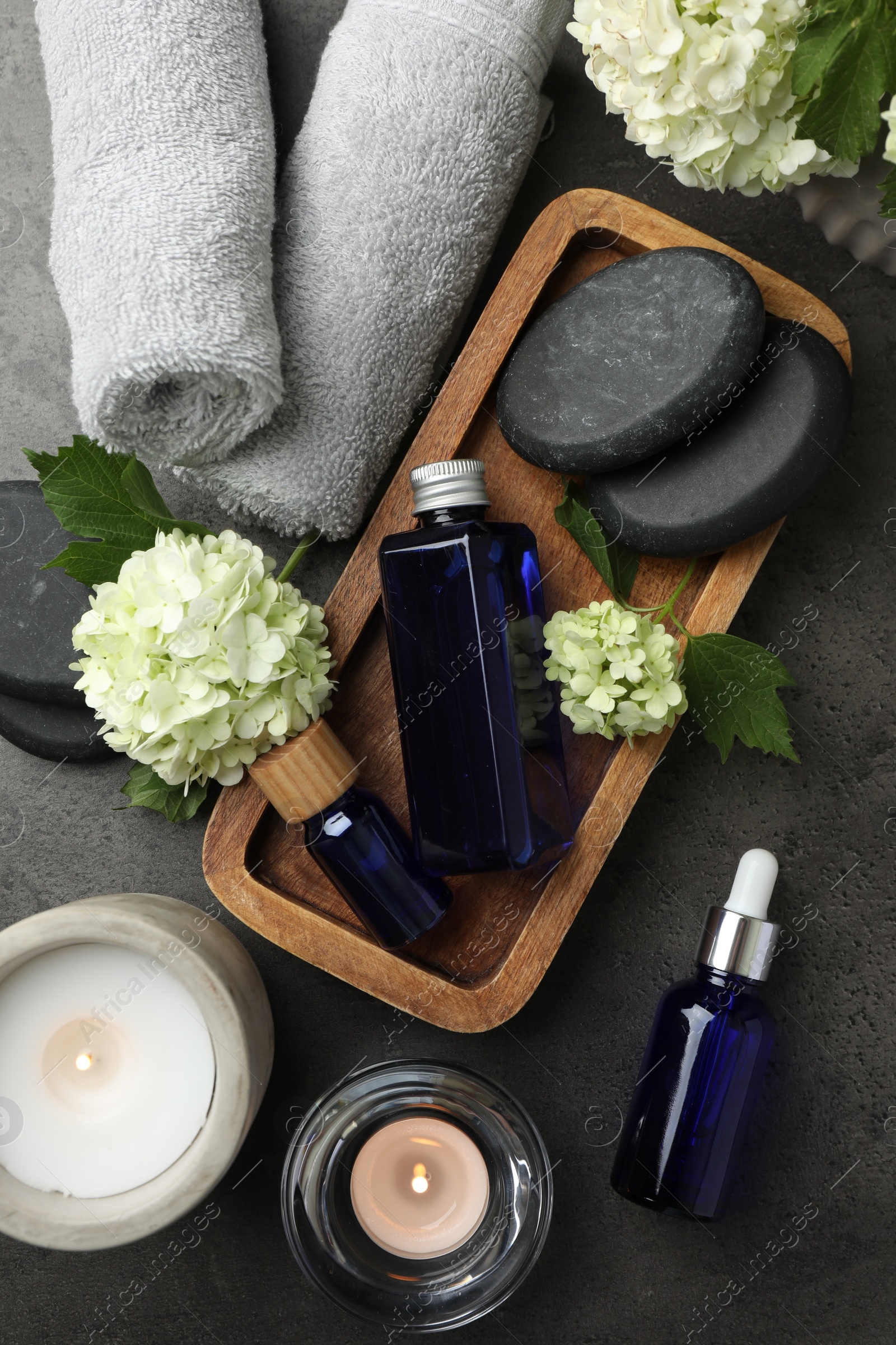 Photo of Flat lay composition with spa products on gray table