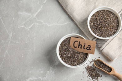 Photo of Flat lay composition with chia seeds on grey background. Space for text