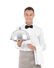 Photo of Waiter holding metal tray with lid on white background