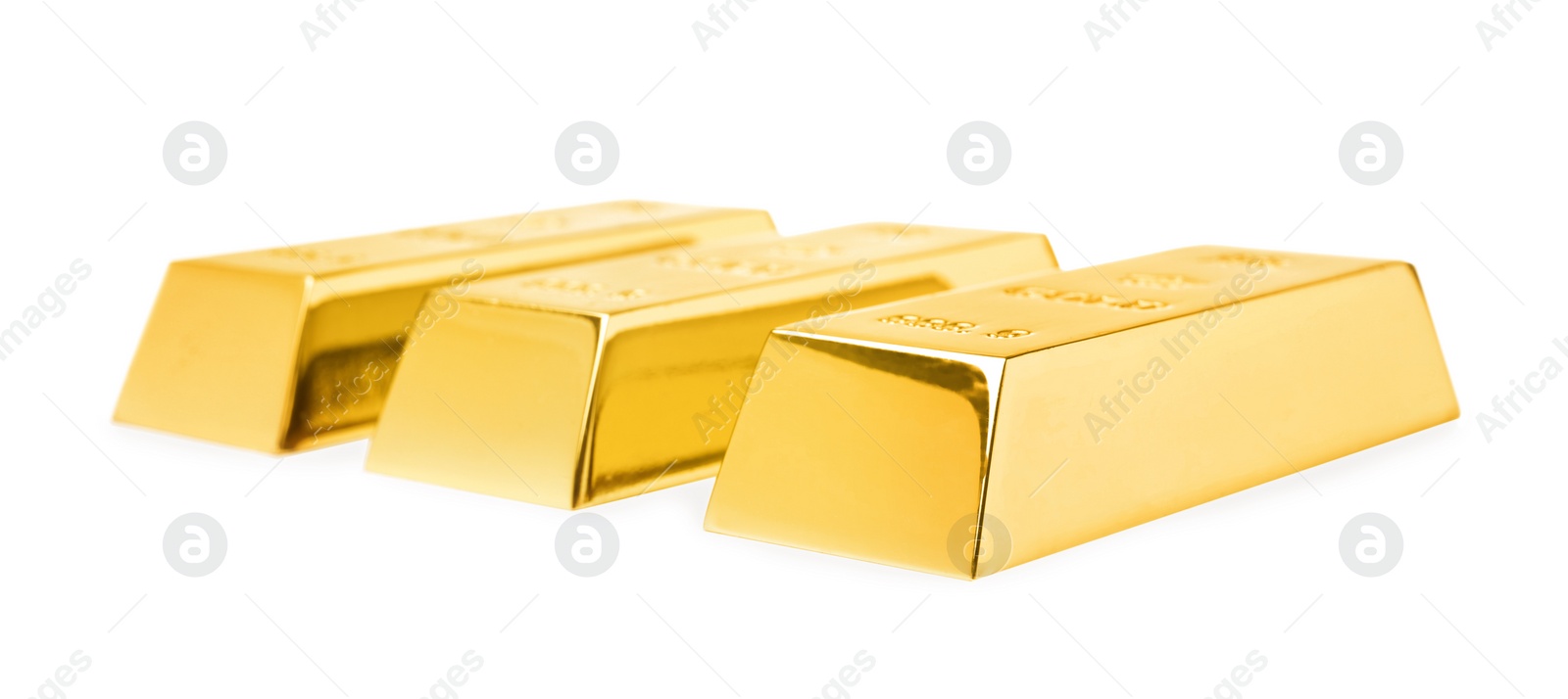 Photo of Precious shiny gold bars on white background