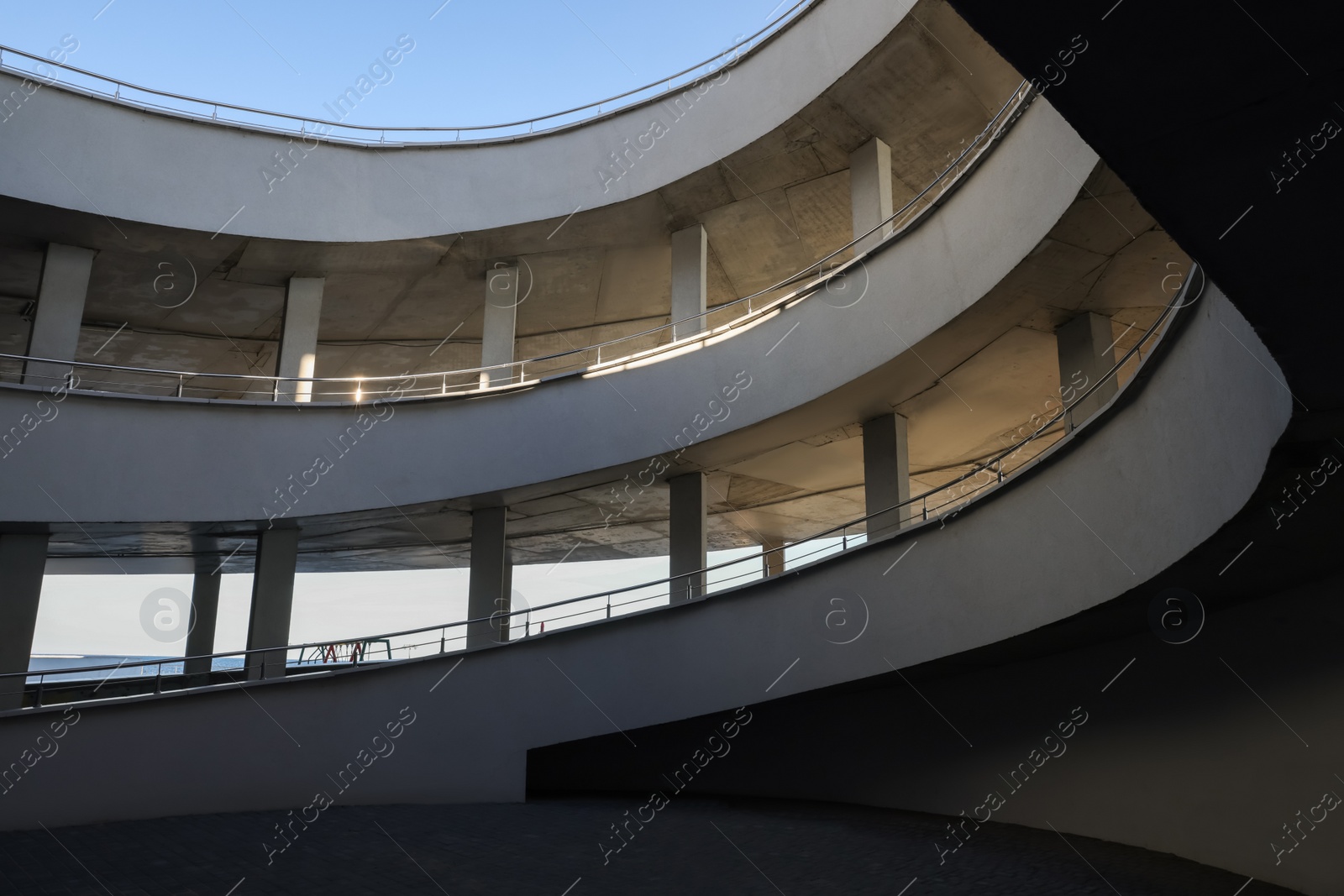 Photo of Multistorey open car parking garage on sunny day