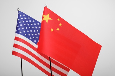 USA and China flags on white background. International relations