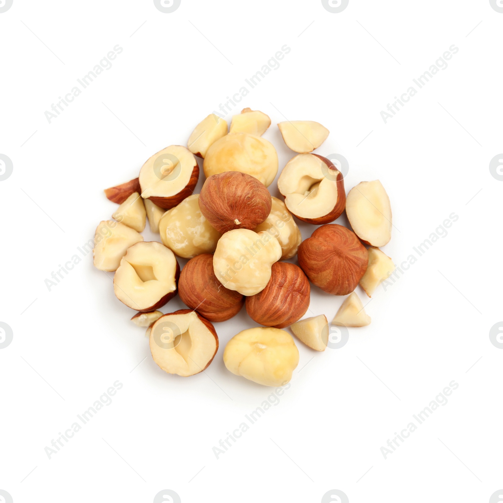 Photo of Heap of tasty hazelnuts on white background, top view