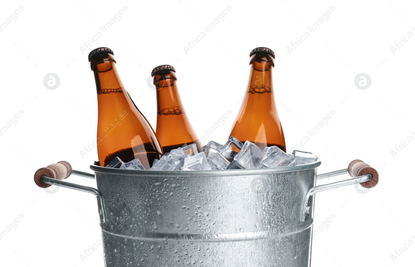 Photo of Metal bucket with bottles of beer and ice cubes isolated on white