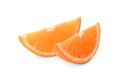 Photo of Slices of fresh ripe orange on white background