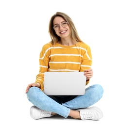 Photo of Young woman in casual outfit with laptop sitting on white background