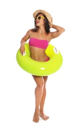 Photo of Beautiful young woman with inflatable ring on white background