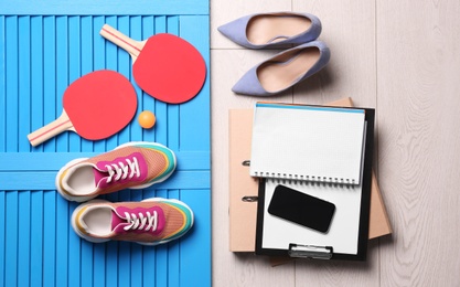 Photo of Flat lay composition with business supplies and sport equipment on color background. Concept of balance between work and life